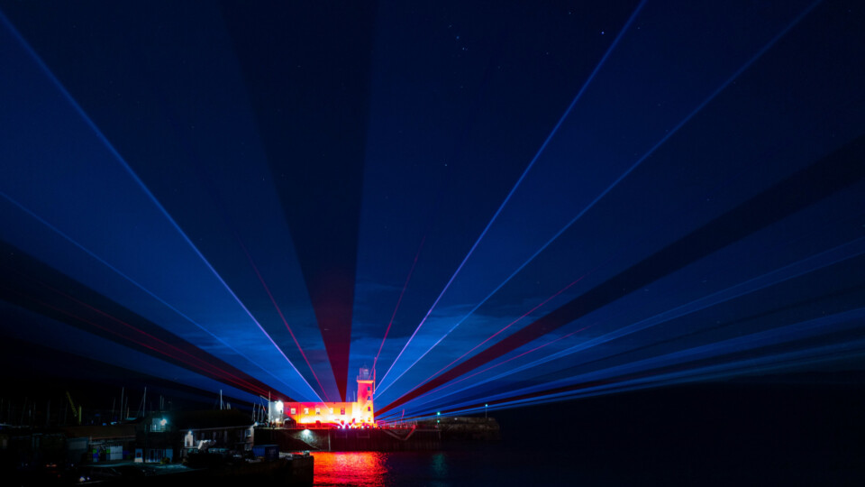 Lazer lights radiating from a building