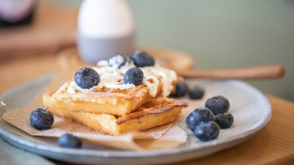 Waffles with cream and blueberries