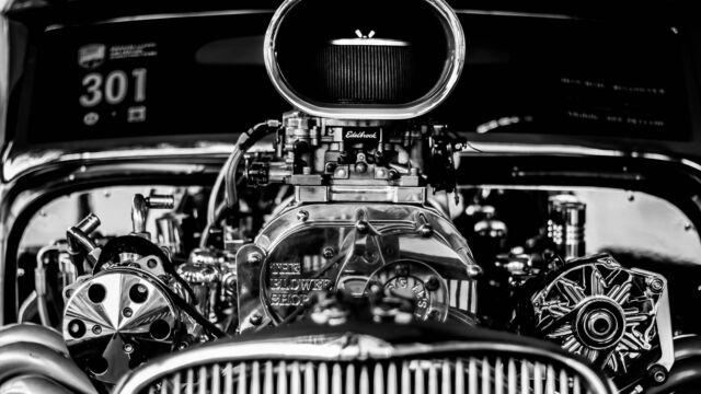 grayscale photography of vintage car engine