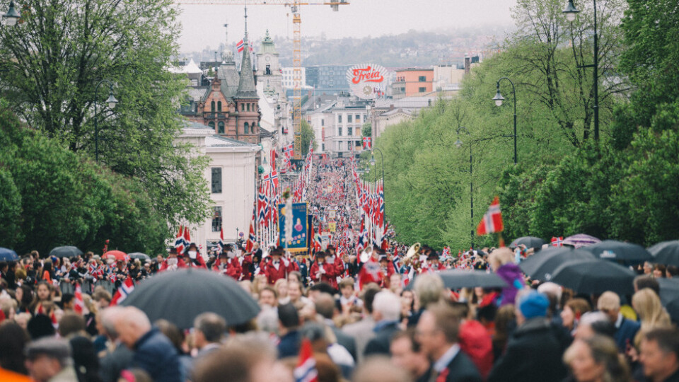 Karl Johans gate on the 17th of May, with a sea of Norwegian Flags and many people