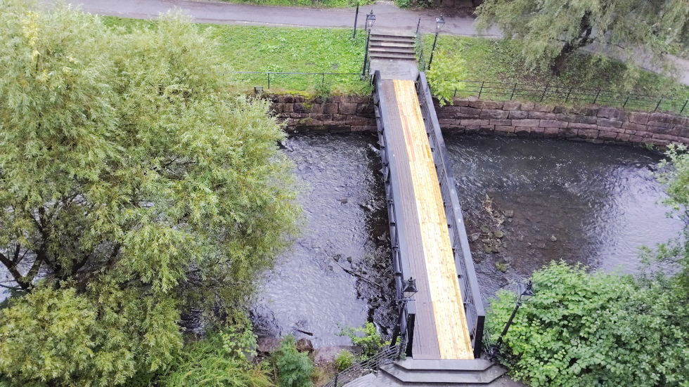 A two tone wet footbridge viewed from above