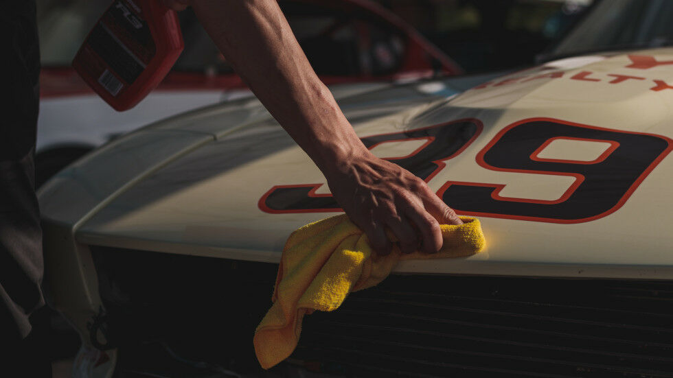 Man polishing a car