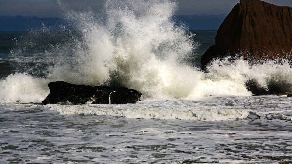 Waves crashing on rocks