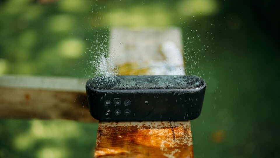 Speakers with water bouncing off them