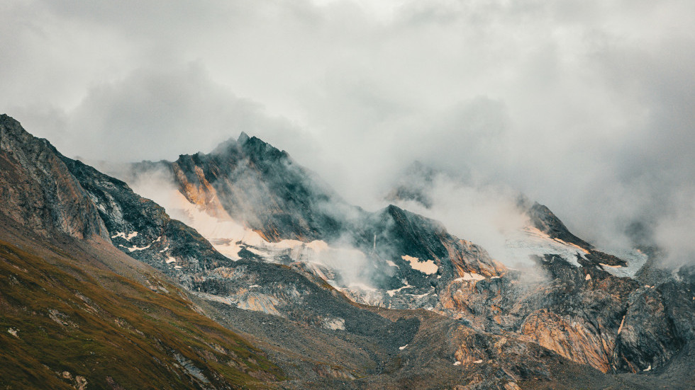 Cloudy, snowy mountains